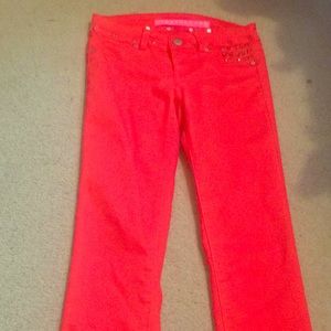 Bright red skinny jeans